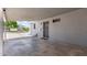 Spacious carport adjacent to the home's entrance, offering sheltered parking and protection from the elements at 2325 E Delgado St, Phoenix, AZ 85022