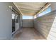 This cozy covered patio offers an inviting outdoor extension with great natural light at 2325 E Delgado St, Phoenix, AZ 85022