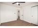 Bedroom features wood-look flooring, and access to the Primary bath at 2345 E Isabella Ave, Mesa, AZ 85204