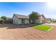 Charming single-story home with desert landscaping and a well-manicured lawn patch at 2345 E Isabella Ave, Mesa, AZ 85204