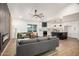 Open concept living room and kitchen area with modern finishes and plenty of natural light at 2345 E Isabella Ave, Mesa, AZ 85204
