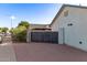 Side yard features a black privacy gate to fenced backyard at 2345 E Isabella Ave, Mesa, AZ 85204