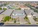 An aerial view displays the home's front elevation and surrounding neighborhood at 25725 S 230Th St, Queen Creek, AZ 85142