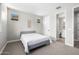 Comfortable bedroom featuring plush carpeting, bright windows, and a cozy atmosphere for restful sleep at 25725 S 230Th St, Queen Creek, AZ 85142