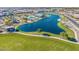 An aerial shot features a community lake with recreational facilities and walking paths at 25725 S 230Th St, Queen Creek, AZ 85142