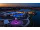 Beautiful aerial view of the community pool at night, creating a serene and inviting atmosphere at 25725 S 230Th St, Queen Creek, AZ 85142