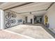 Spacious three-car garage, perfect for parking and storage with mounted bike racks at 25725 S 230Th St, Queen Creek, AZ 85142