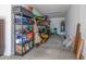 Cluttered garage space with ample room for storage on shelves at 25725 S 230Th St, Queen Creek, AZ 85142