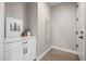 Hallway with a built-in storage cabinet and small decor at 25725 S 230Th St, Queen Creek, AZ 85142