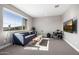Upstairs den area with comfortable seating and lots of natural light at 25725 S 230Th St, Queen Creek, AZ 85142