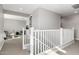 Upstairs loft area leading to secondary living space with great natural light at 25725 S 230Th St, Queen Creek, AZ 85142