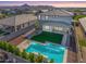 Aerial view of a sparkling pool and backyard with mountain views at 25725 S 230Th St, Queen Creek, AZ 85142