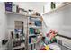 Organized storage with shelves, bins, and carts for various supplies and materials at 25725 S 230Th St, Queen Creek, AZ 85142