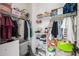 Organized walk-in closet featuring ample storage shelves, rods, and compartments to neatly store belongings at 25725 S 230Th St, Queen Creek, AZ 85142