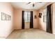 Calm bedroom with dark curtains, soft lighting, and neutral wall paint, with two large windows at 26926 N 55Th Ln, Phoenix, AZ 85083