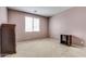 Cozy carpeted bedroom with closet and window at 26926 N 55Th Ln, Phoenix, AZ 85083