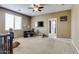 Comfortable loft space with a desk, chair, and a view of the neighborhood at 26926 N 55Th Ln, Phoenix, AZ 85083