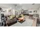 Spacious game room with pool table, foosball, darts, and comfortable seating offers ample entertainment space at 2721 E Tamarisk St, Gilbert, AZ 85296