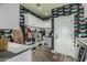 Well-organized mud room with custom cabinetry, hooks, and storage space offers convenience and style at 2721 E Tamarisk St, Gilbert, AZ 85296