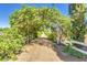 Scenic walking path with lush foliage creating a beautiful, natural canopy at 2721 E Tamarisk St, Gilbert, AZ 85296