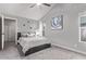 Comfortable bedroom featuring plush carpeting, vaulted ceilings, and a minimalist aesthetic at 3323 N 28Th St, Phoenix, AZ 85016