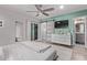 Cozy bedroom with ceiling fan, hardwood floors, access to bathroom and outdoor patio with sliding glass door at 3323 N 28Th St, Phoenix, AZ 85016