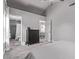 View of a bedroom looking towards bathroom and dining area, showcasing open floor plan at 3323 N 28Th St, Phoenix, AZ 85016