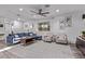 Comfortable living room with a blue sectional sofa, area rug, and natural light at 3323 N 28Th St, Phoenix, AZ 85016