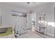 Bright home office features a modern desk, stylish shelving, and a comfortable chair at 3323 N 28Th St, Phoenix, AZ 85016
