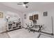 Bright home office features a modern desk, stylish shelving, and a comfortable chair at 3323 N 28Th St, Phoenix, AZ 85016