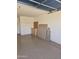 Clean garage with organized storage solutions and epoxy flooring at 3454 E Bellerive Pl, Chandler, AZ 85249