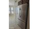 Stainless steel refrigerator featuring french doors, and bright natural light at 3454 E Bellerive Pl, Chandler, AZ 85249