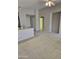 Open living room with neutral carpet and a ceiling fan at 3454 E Bellerive Pl, Chandler, AZ 85249
