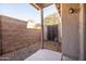 A backyard with a concrete patio and block wall fencing for privacy at 3756 E Waite Ln, Gilbert, AZ 85295