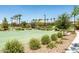 Community basketball court surrounded by mature landscaping and a walking trail at 3756 E Waite Ln, Gilbert, AZ 85295