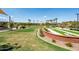 Picturesque community park featuring mature landscaping, walking trails, and a bocce ball court at 3756 E Waite Ln, Gilbert, AZ 85295