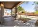 Spacious covered front porch providing ample shade and a pleasant view of the neighborhood at 3756 E Waite Ln, Gilbert, AZ 85295