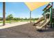 Community playground with slides, swings, and covered seating area for outdoor fun at 3756 E Waite Ln, Gilbert, AZ 85295