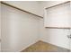 Large walk-in closet featuring shelving for optimal storage and organization at 3756 E Waite Ln, Gilbert, AZ 85295