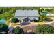 Aerial view of community center with lake, walking paths, pool and lush landscaping at 4024 E Maplewood St, Gilbert, AZ 85297