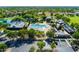 Aerial view of community amenities including pool, clubhouse, playground, parking, and green spaces at 4024 E Maplewood St, Gilbert, AZ 85297