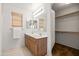 Bathroom featuring double sinks and a large mirror at 4024 E Maplewood St, Gilbert, AZ 85297