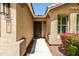Welcoming front entrance with a charming door and picturesque landscaping at 4024 E Maplewood St, Gilbert, AZ 85297