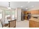 Kitchen with stainless appliances, tile flooring, and lots of light at 4024 E Maplewood St, Gilbert, AZ 85297