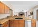 Spacious kitchen featuring granite countertops and stainless appliances at 4024 E Maplewood St, Gilbert, AZ 85297