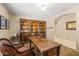 Spacious office showcasing custom wood bookcase and executive desk at 4024 E Maplewood St, Gilbert, AZ 85297