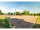 Sand volleyball court offers residents a fun recreational amenity with a well-maintained community park at 4024 E Maplewood St, Gilbert, AZ 85297