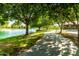 Enjoy the scenery with this relaxing view of the lake from the community walking path at 4024 E Maplewood St, Gilbert, AZ 85297