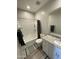 Bathroom with vanity, tub/shower combo, and gray tile flooring at 4073 E Amoroso Dr, Gilbert, AZ 85296