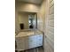 Bathroom with granite countertop and white cabinets at 4073 E Amoroso Dr, Gilbert, AZ 85296